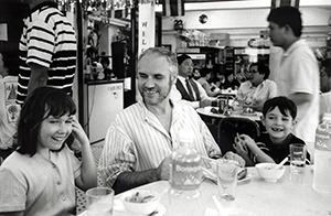 Academic Jeremy Tambling and his children in a Thai restaurant, Shek O, 30 December 1997