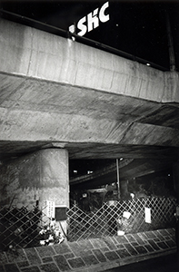 Memorial flowers placed for victims of a bus accident  -  a view from near the Sun Hung Kai Centre, Wanchai, 21 February 1998