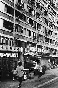 Old public housing block with shops at street level in Lok Sin Road, near Kowloon City, 12 May 1998