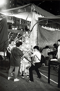 A Chinese opera performer preparing to go on stage, Southorn Playground, Wanchai, 13 May 1998