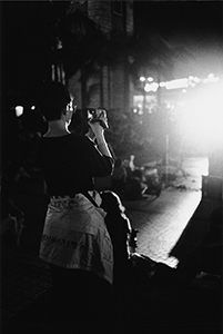 Making a video of a performance at the June Fourth memorial concert, outside the Hong Kong Cultural Centre, 3 June 1998