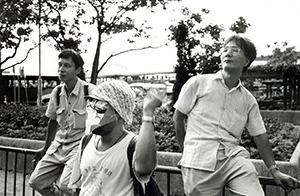 Protesters near the Convention and Exhibition Centre on the occasion of a visit to that location by then-President Jiang Zemin, 1 July 1998