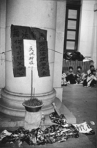 Right-of-abode protesters with a makeshift shrine outside the Legislative Council Building, Central, 20 May 1999