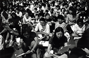 People holding candles at the June 4th memorial rally, Victoria Park, Causeway Bay, 4 June 1999