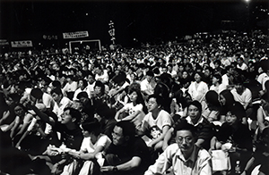 People holding candles at the June 4th memorial rally, Victoria Park, Causeway Bay, 4 June 1999