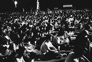 Crowds holding candles at the June 4th memorial rally, Victoria Park, Causeway Bay, 4 June 1999