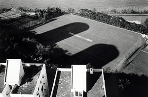 Shadows of buildings on the HKU sports ground at Sandy Bay, 22 September 1999