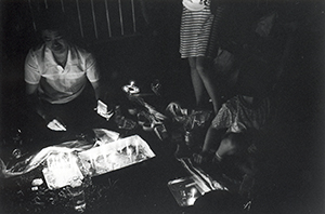 Lighting candles in Victoria Park during the Mid-Autumn festival, 24 September 1999