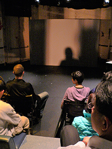 Waiting for a performance to start in the Fringe Club theatre, 28 January 2005