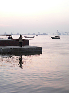 Lau Fau Shan, with Shenzhen Bay Bridge under construction in the background, 23 January 2005