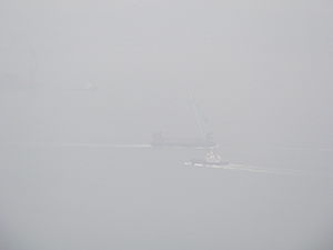 Boats in misty weather, viewed from Sheung Wan, Hong Kong Island, 28 January 2005