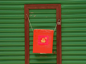 Temporary cardboard mailbox placed outside a business closed over the Lunar New Year, Sheung Wan, 13 February 2005