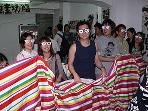 Participants in a performance by Kwok Mang Ho, Para Site Art Space, 23 April 2005