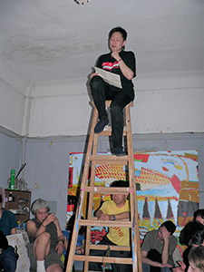 Priscilla Leung reading at a Moon Poetry Night event at Yank Wong's studio, Happy Valley, 24 April 2005