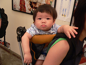 Chen Ya with her son at the Fringe Club, 28 May 2005