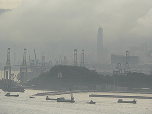 Victoria Harbour with view of Stonecutters Island, site of the People's Liberation Army naval base, 10 May 2005