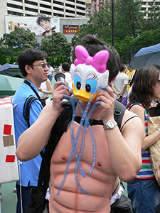 Protesting about the Hong Kong Disneyland project on the pro-democracy march, from Victoria Park to Central, 1 July 2005