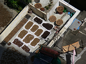 Drying goods on the rooftop of a building, Sheung Wan, Hong Kong Island, 5 July 2005