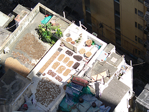 Drying goods on the rooftop of a building, Sheung Wan, Hong Kong Island, 5 July 2005