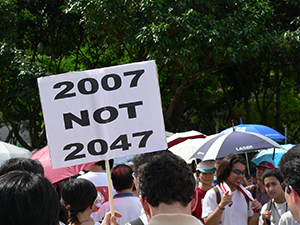 Protest sign, pro-democracy march, from Victoria Park to Central, 1 July 2005