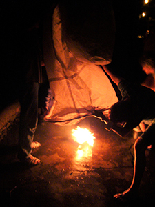 lnflating a paper hot air balloon prior to launch, as part of a traditional Mid-Autumn Festival celebration at Sheung Wo Hang Village, north-eastern New Territories, 18 September 2005