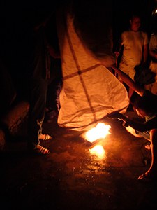 lnflating a paper hot air balloon prior to launch, as part of a traditional Mid-Autumn Festival celebration at Sheung Wo Hang Village, north-eastern New Territories, 18 September 2005