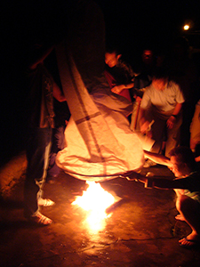 lnflating a paper hot air balloon prior to launch, as part of a traditional Mid-Autumn Festival celebration at Sheung Wo Hang Village, north-eastern New Territories, 18 September 2005