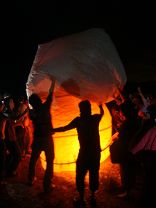 A large sky lantern is prepared for flight at Sheung Wo Hang Village, north-eastern New Territories, 18 September 2005