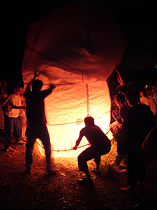 A large sky lantern is prepared for flight at Sheung Wo Hang Village, north-eastern New Territories, 18 September 2005