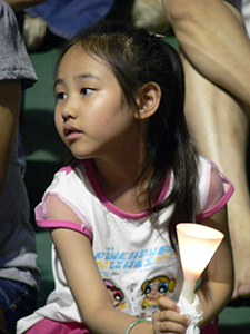 Young participant in the June Fourth memorial rally, Victoria Park, 4 June 2006