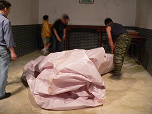 People preparing a paper sky lantern for the Mid-Autumn Festival, Sheung Wo Hang Village, North East New Territories, 6 October 2006