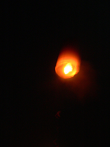 Launching a sky lantern during the Mid-Autumn Festival, Sheung Wo Hang Village, North East New Territories, 7 October 2006