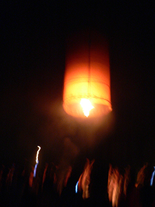 Launching a sky lantern during the Mid-Autumn Festival, Sheung Wo Hang Village, North East New Territories, 7 October 2006