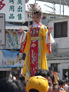 Girl in traditional Chinese costume on a float, Tai Ping Ching Chiu at Shek O, a once in a decade 'Prayer Festival', 4 November 2006