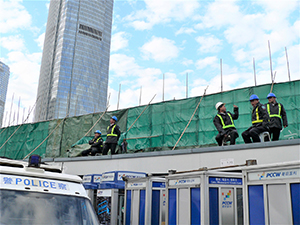 Security guards on duty during the demolition of the Edinburgh Place Star Ferry Terminal, 16 December 2006