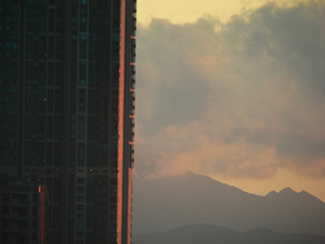 Light on a building at sunset: a view west from Sheung Wan, Hong Kong Island, 24 June 2007