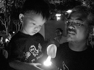 Zunzi and his son at the June Fourth memorial rally, Victoria Park, 4 June 2007