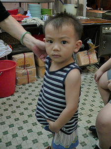 Child in a restaurant, Tai Hang, Hong Kong Island, 4 June 2007