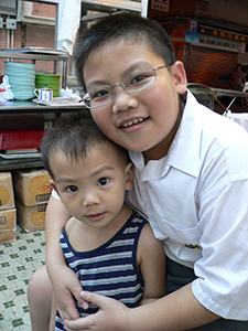 Children in a restaurant, Tai Hang, Hong Kong Island, 4 June 2007