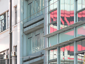 Buildings, Sheung Wan, with reflection of the Shun Tak Centre, 22 June 2007