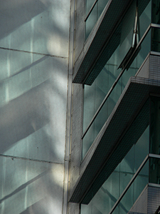 Light reflected from a building facade onto an adjoining wall, Sheung Wan, Hong Kong Island, 19 July 2007