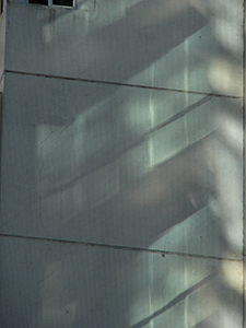 Light reflected from a building facade onto an adjoining wall, Sheung Wan, Hong Kong Island, 19 July 2007