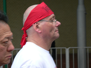 Catholic priest Franco Mella participating in the annual pro-democracy march, Causeway Bay, 1 July 2007