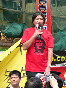 Leung Kwok-hung, addressing crowds on the annual pro-democracy march, 1 July 2007