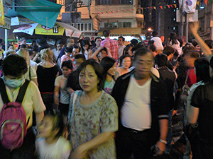 Street scene during the Fire Dragon parade, Tai Hang, Hong Kong Island, 25 September 2007