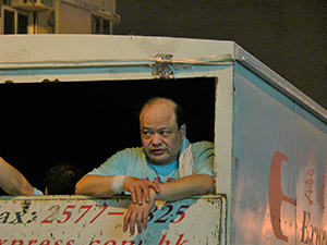 Man on the back of a truck, Tai Hang, Hong Kong Island, 25 September 2007
