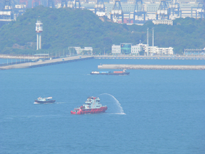 Fire boat testing its equipment, near Stonecutters Island, 11 December 2007