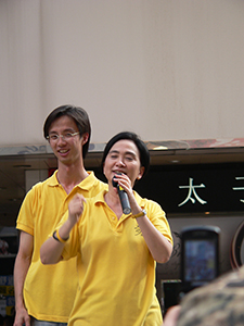 Emily Lau, addressing participants in the annual pro-democracy march, Causeway Bay, 1 July 2008