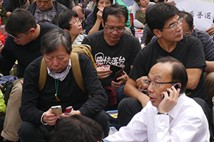 Politicians Lee Cheuk-yan and Alan Leong at the Admiralty Umbrella Movement site on its last day, Harcourt Road, 11 December 2014