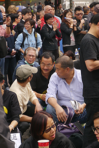 Businessman Jimmy Lai, participating in a sit-in on the final day of the Admiralty Umbrella Movement occupation site, 11 December 2014